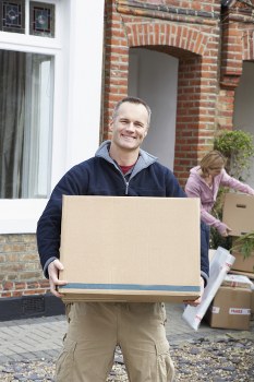Moving van loading household items for a Hackney removal service