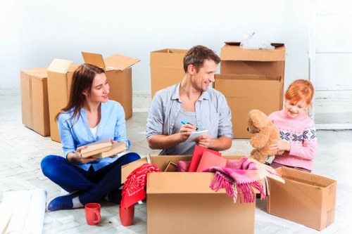 Packed moving boxes ready in a Hackney home