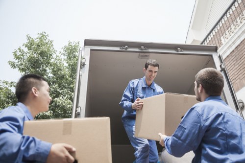 Students preparing boxes for removals in Hackney