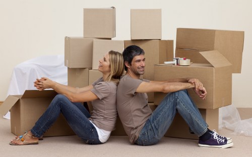 Local movers navigating a busy Hackney street during a move