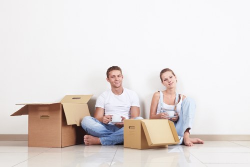 Careful loading of furniture into a moving truck in Hackney