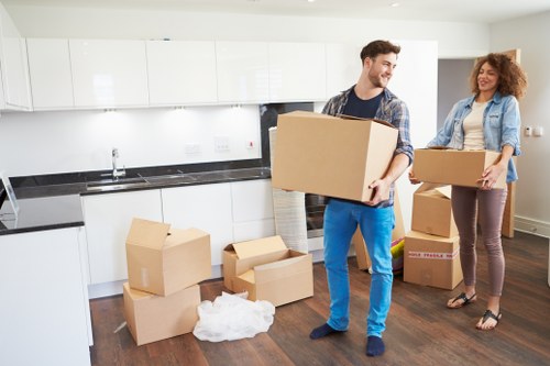 Packed boxes and furniture ready for transport in Hackney