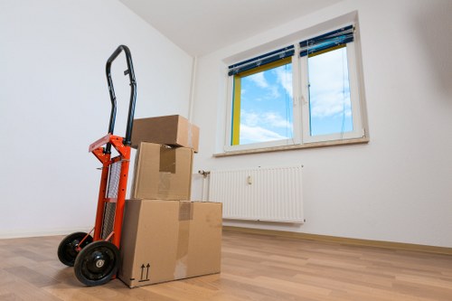 Office relocation equipment and boxed items for a Hackney business move
