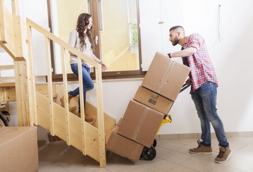 Careful furniture dismantling during a Hackney flat removal