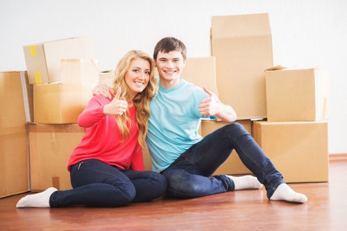 Professional office movers handling desks and equipment in Hackney