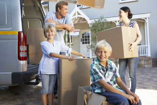 Local Hackney moving service loading items into a van