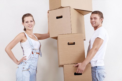 Professional movers packing household items in Hackney