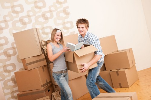 Specialist movers handling a piano in a Hackney property