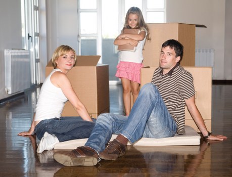 Careful wrapping of fragile household items during packing service